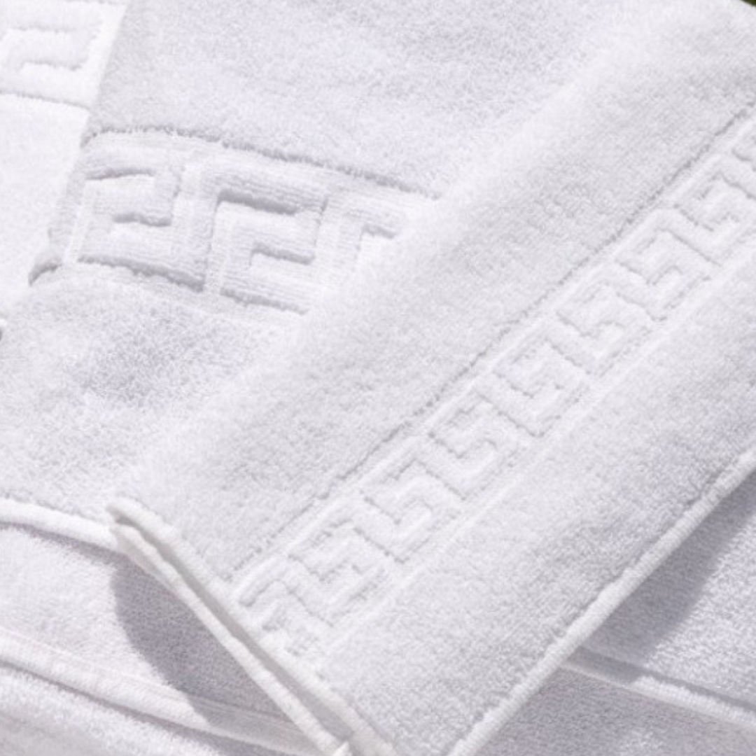 Alfombra hotelera 100% algodón diseño greca