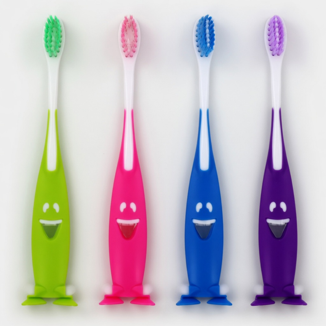 Cepillo dental infantil en colores surtidos envasado en flow pack transparente individual, amenity de baño para hoteles y apartamentos turísticos orientados a familias con niños