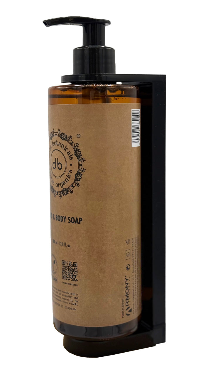 Esempio di flacone dosatore installato sulla parete della doccia di un hotel. Prodotti di cortesia per hotel e appartamenti turistici.