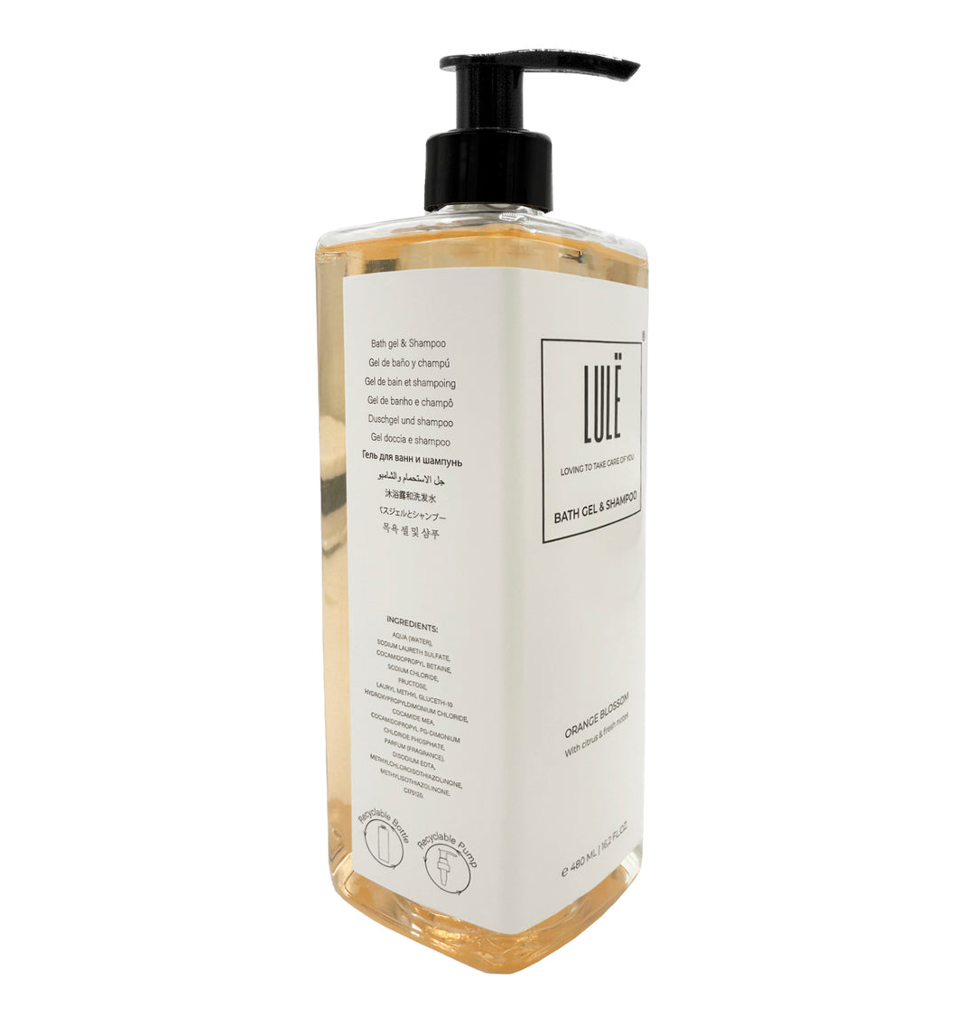 Gamme de flacons doseurs Lule de 480 ml en RPET recyclé avec bouchon noir, disponibles pour savon, gel-shampoing, shampoing et lotion, avec une étiquette en 11 langues