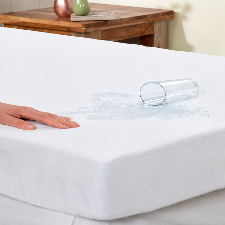 Protector colchón hotel TENCEL 100% con membrana PU impermeable transpirable y resistente al lavado a 95 °C para hoteles y alojamientos turísticos al por mayor