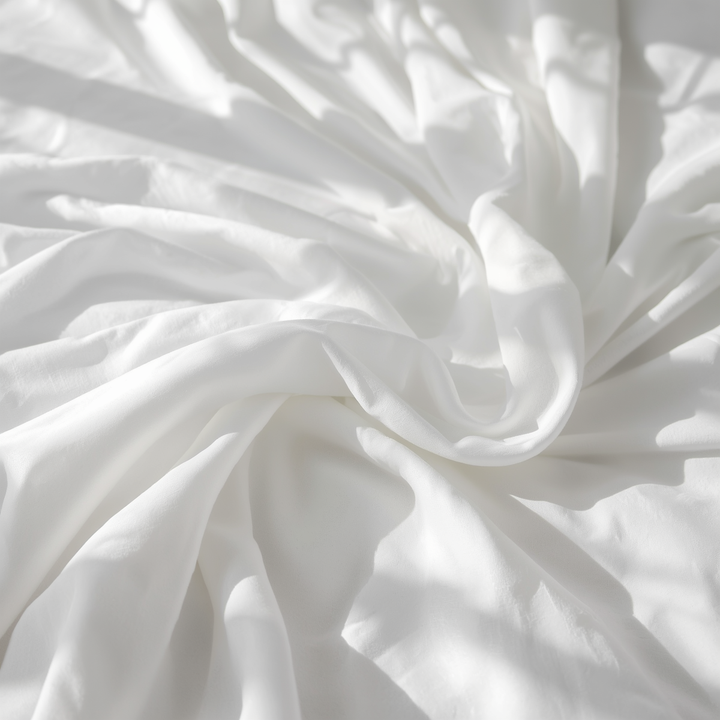 White 144-thread-count 100% cotton hotel-style fitted sheet with elastic edges, designed to withstand frequent washing at up to 40°C, for hotels, hostels, and vacation rentals (wholesale)