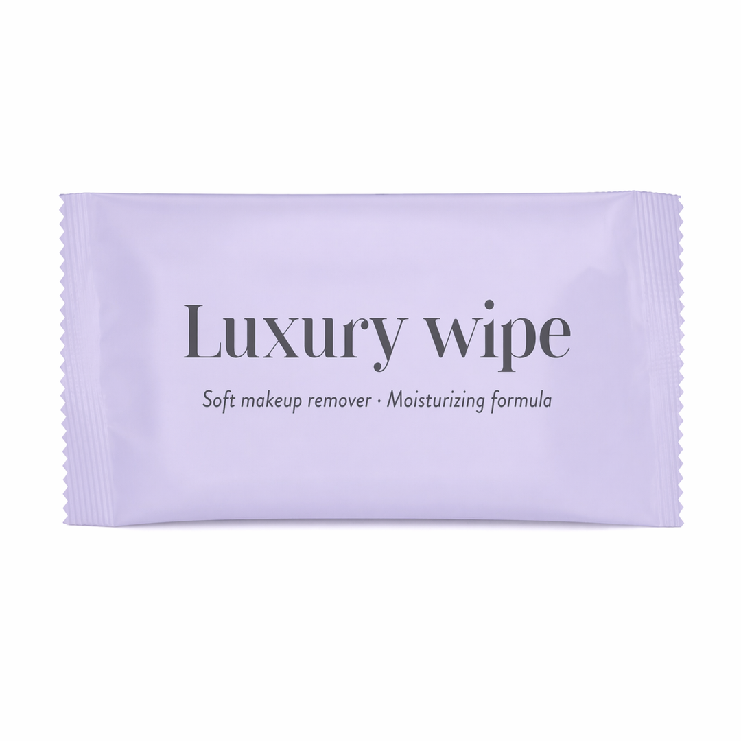 Toallita desmaquillante Luxury en envase flow pack individual, amenity de baño suave y eficaz para hoteles que protege el textil del maquillaje