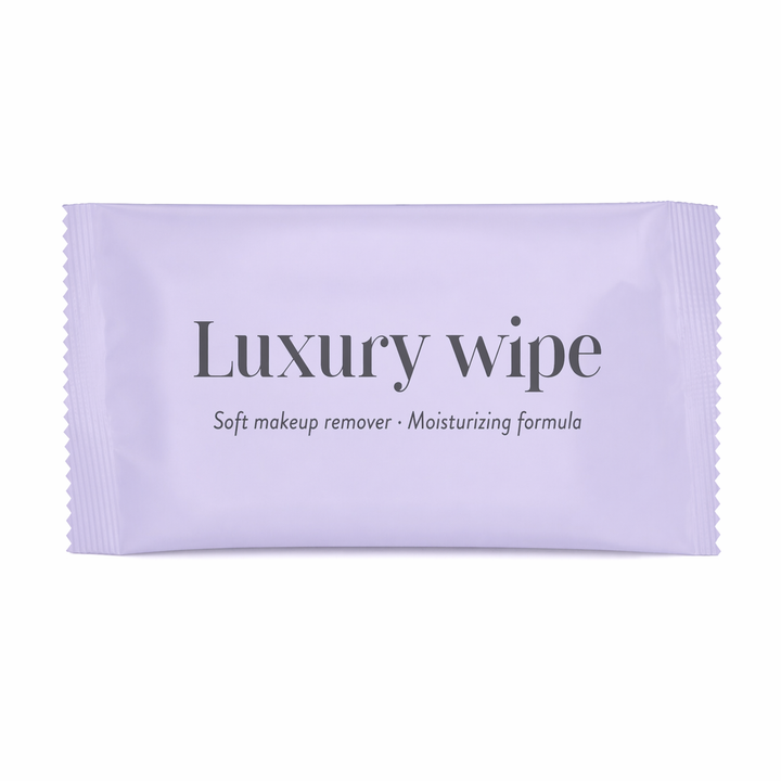 Toallita desmaquillante Luxury en envase flow pack individual, amenity de baño suave y eficaz para hoteles que protege el textil del maquillaje