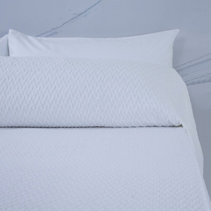 Colcha hotelera jacquard para habitaciones elegantes