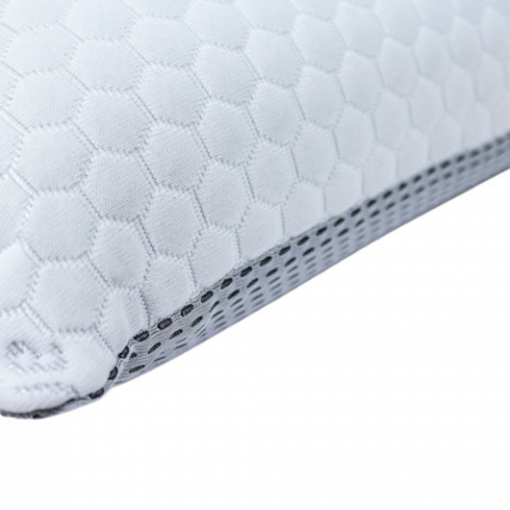 Hotel pillow with activated carbon core and washable cover