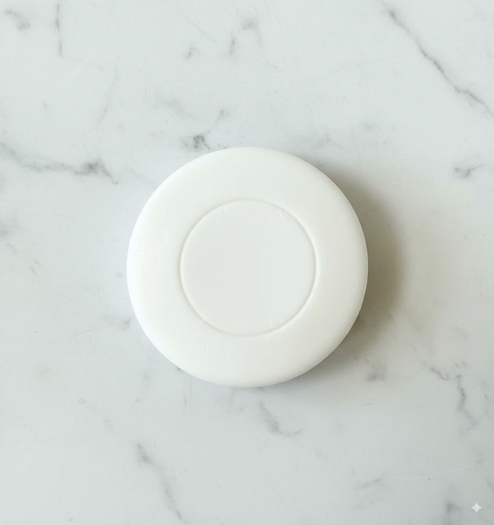 Small BIO soap dispenser for hotels, sustainable and ready to use in rooms.