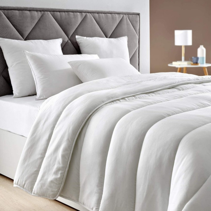 Lightweight comforter filler with soft microfiber lining for tourist accommodations