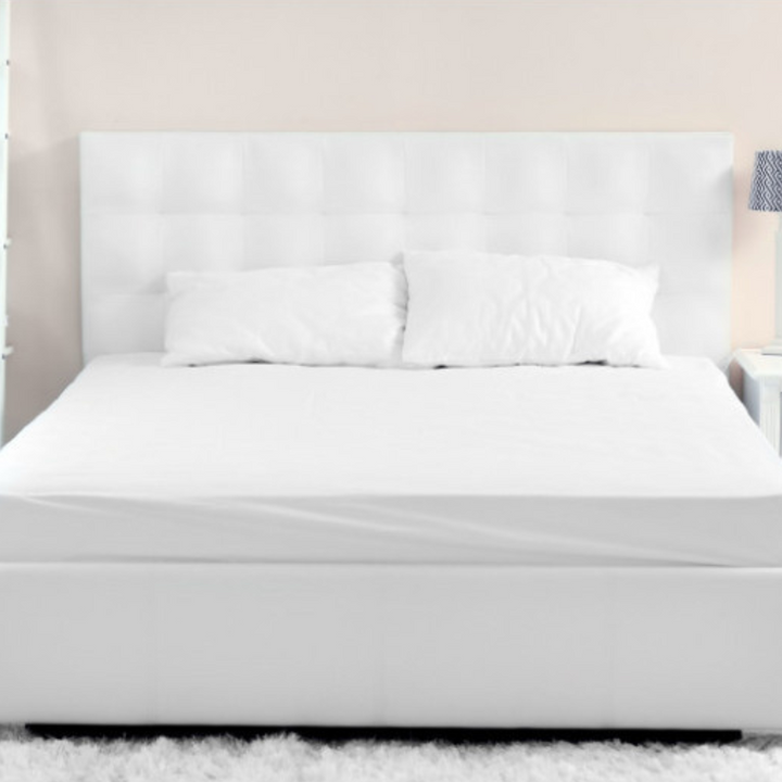 White 144 thread count folded fitted sheets for hotel bed.