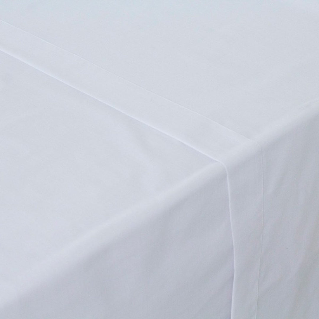 White cotton 144 thread count hotel top sheets folded in package