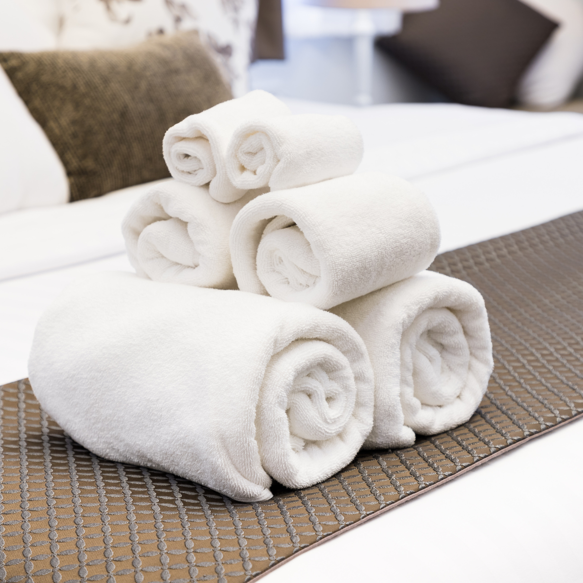 Asciugamani bianchi per il settore alberghiero e della ristorazione