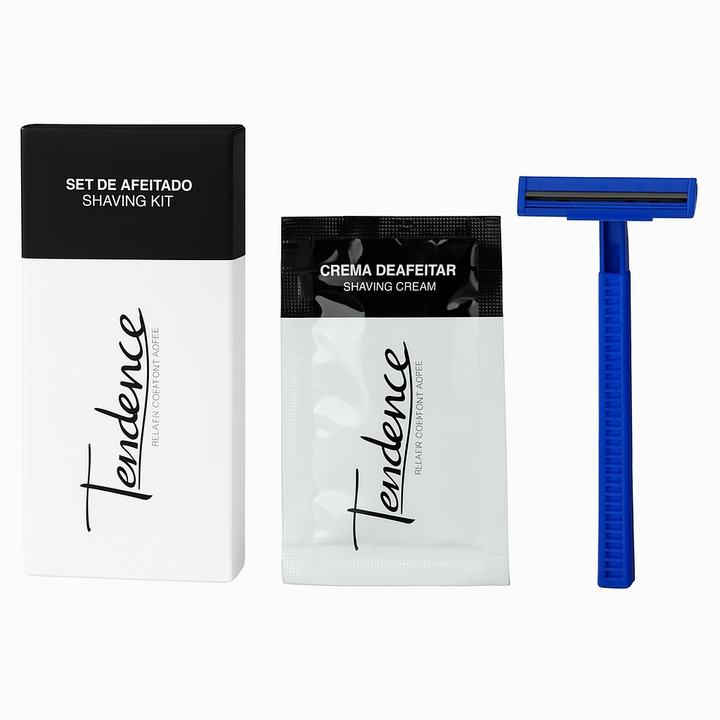 Confezione da barba per hotel con rasoio e crema in una scatola di cartone per hotel.