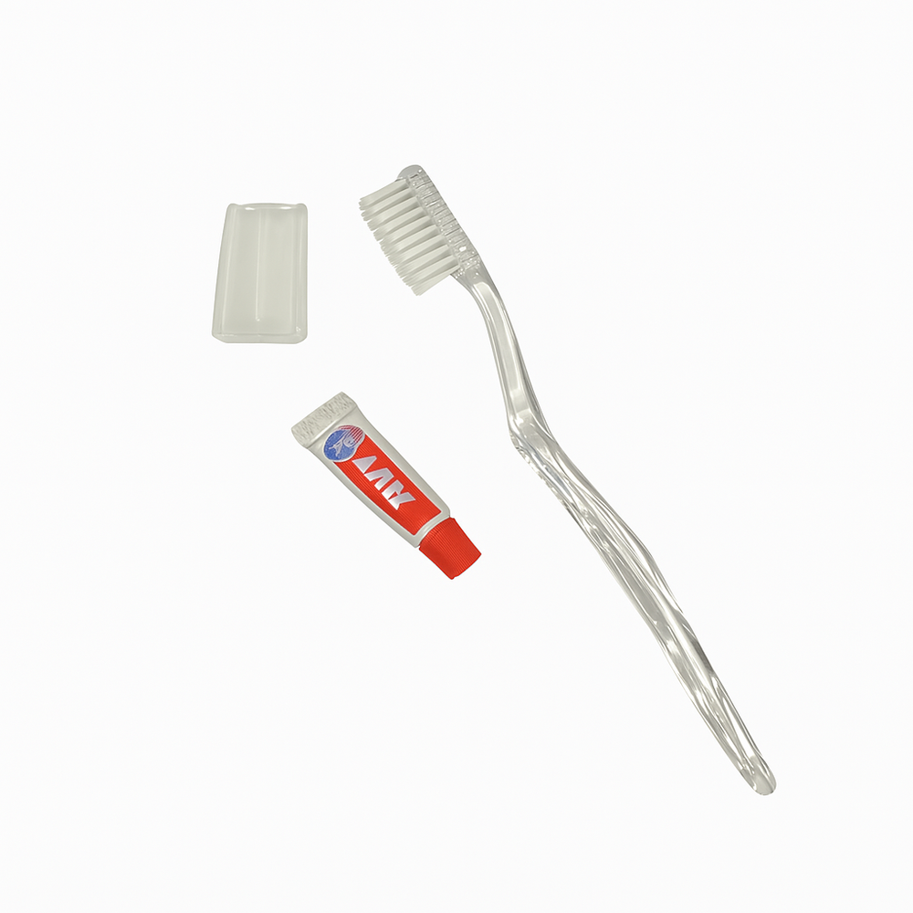 Kit dentale per hotel in una scatola di cartone bianca